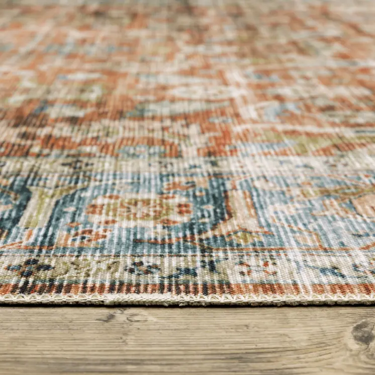 5' X 7' Rust Blue Ivory And Gold Oriental Printed Stain Resistant Non Skid Area Rug