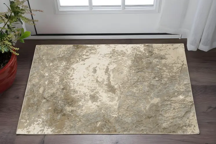 2' X 3' Gray and Ivory Abstract Power Loom Area Rug