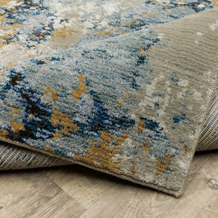 7' X 10' Gray and Ivory Abstract Power Loom Area Rug