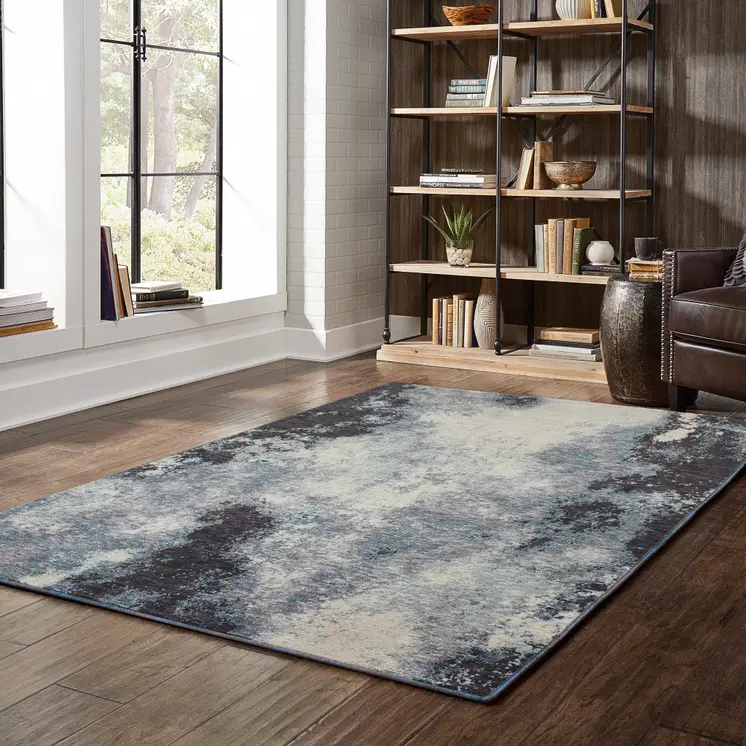 2' X 3' Blue and Ivory Abstract Power Loom Area Rug