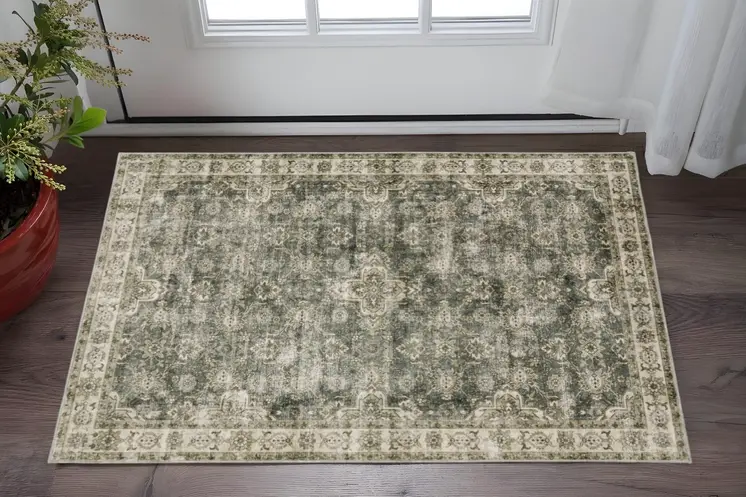 2' X 3' Ivory And Blue Oriental Printed Stain Resistant Non Skid Area Rug