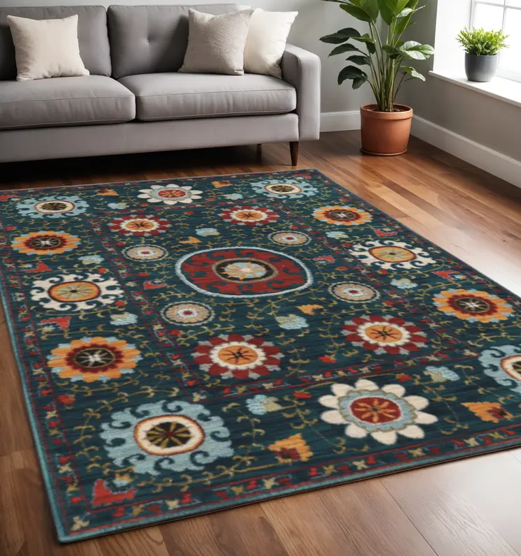 5' X 8' Teal Blue Rust Gold And Ivory Floral Power Loom Stain Resistant Area Rug