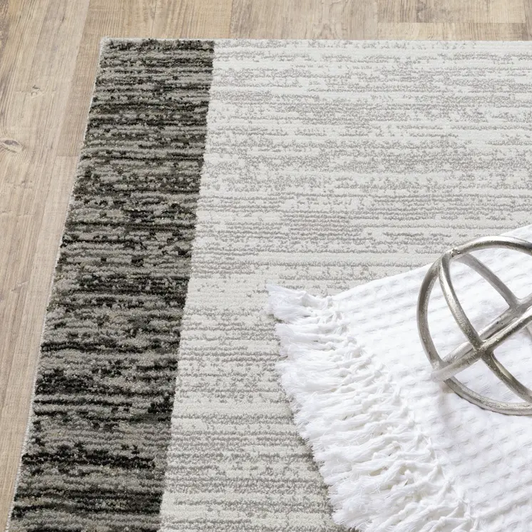 5' X 7' Gray and Ivory Geometric Power Loom Area Rug
