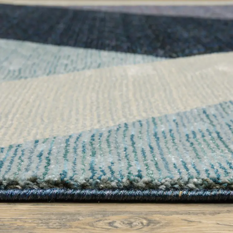 9' X 12' Blue Purple Grey and Teal Geometric Power Loom Area Rug