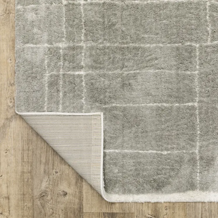 10' X 13' Grey And Ivory Geometric Shag Power Loom Stain Resistant Area Rug