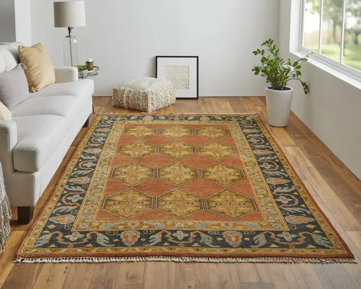 8' X 10' Tan Orange And Brown Wool Floral Hand Knotted Stain Resistant Area Rug
