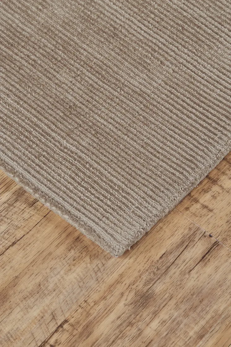 5' X 8' Tan Ivory And Taupe Hand Woven Area Rug