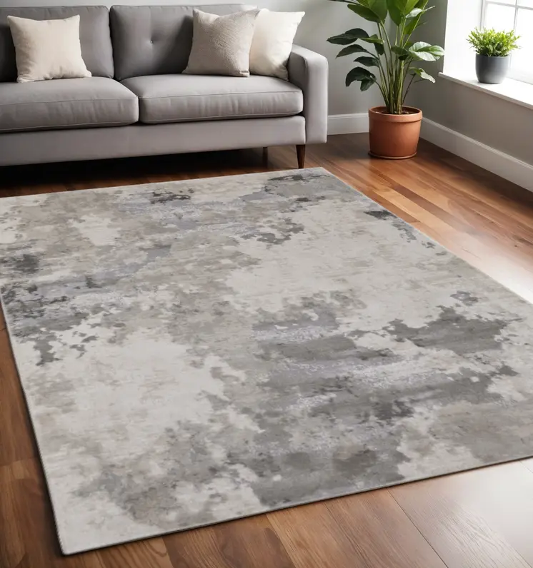 5' X 8' Ivory And Gray Abstract Stain Resistant Area Rug