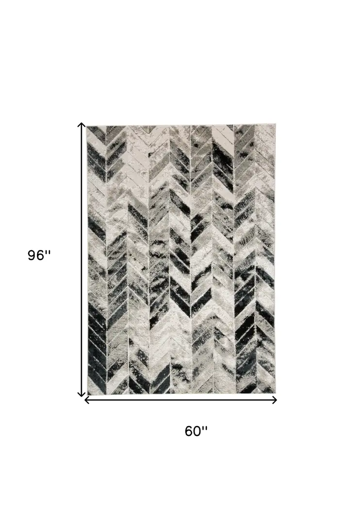 5' X 8' Black Gray And Silver Geometric Stain Resistant Area Rug