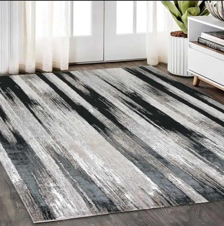 5' X 8' Black Silver and Gray Abstract Power Loom Area Rug