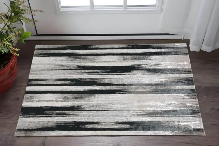 2' X 3' Black Silver and Gray Abstract Power Loom Area Rug