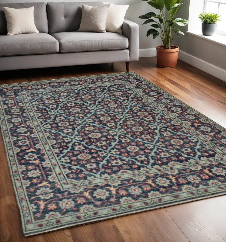 5' X 8' Blue Green And Red Wool Floral Hand Knotted Distressed Stain Resistant Area Rug With Fringe