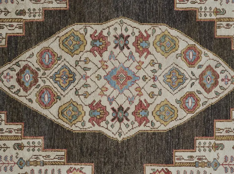 5' X 8' Brown Yellow And Green Wool Floral Hand Knotted Distressed Stain Resistant Area Rug With Fringe
