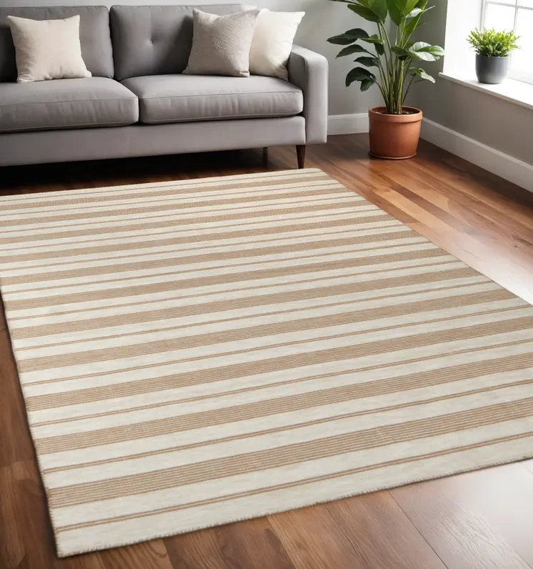 5' X 8' Ivory Taupe And Brown Striped Dhurrie Hand Woven Stain Resistant Area Rug