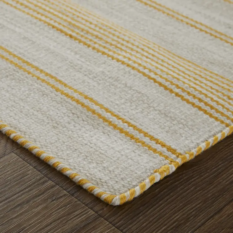 5' X 8' Yellow And Ivory Striped Dhurrie Hand Woven Stain Resistant Area Rug