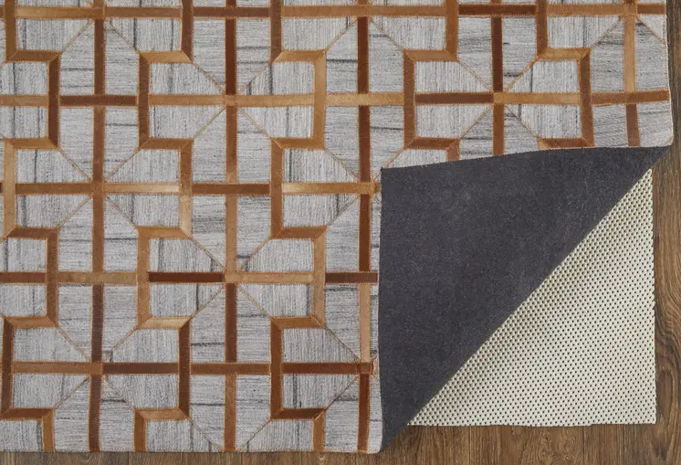 5' X 8' Tan and Brown Geometric Hand Woven Area Rug