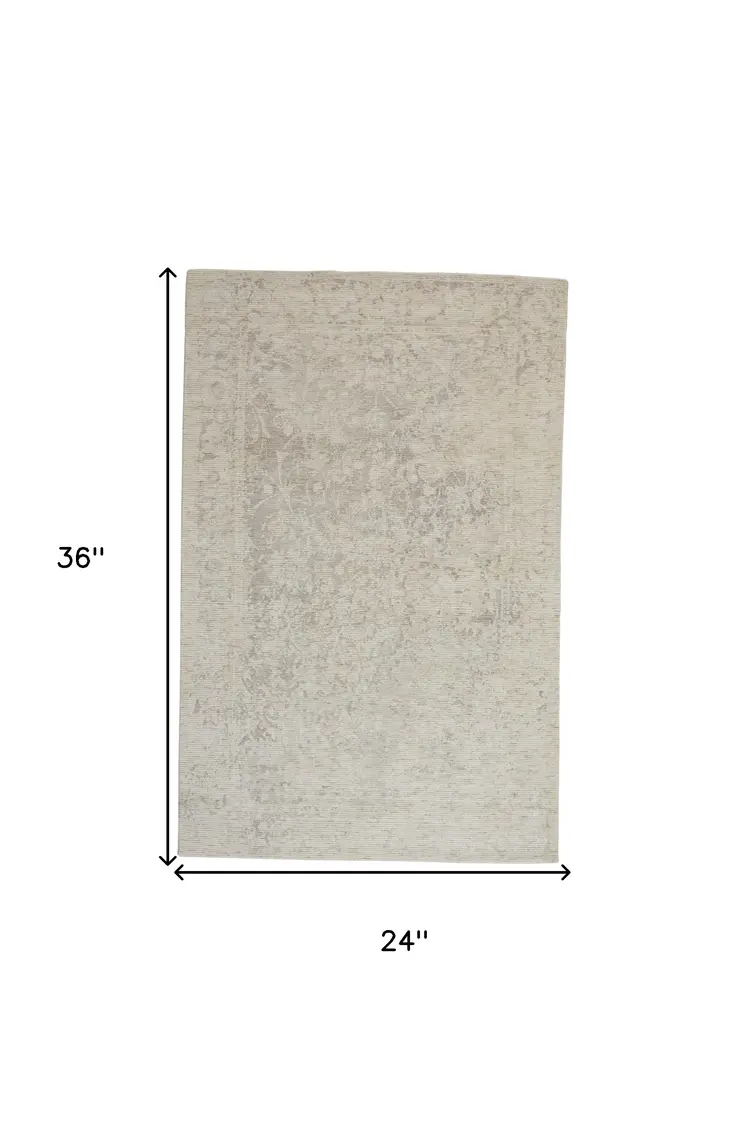 2' X 3' Ivory And Tan Abstract Hand Woven Area Rug