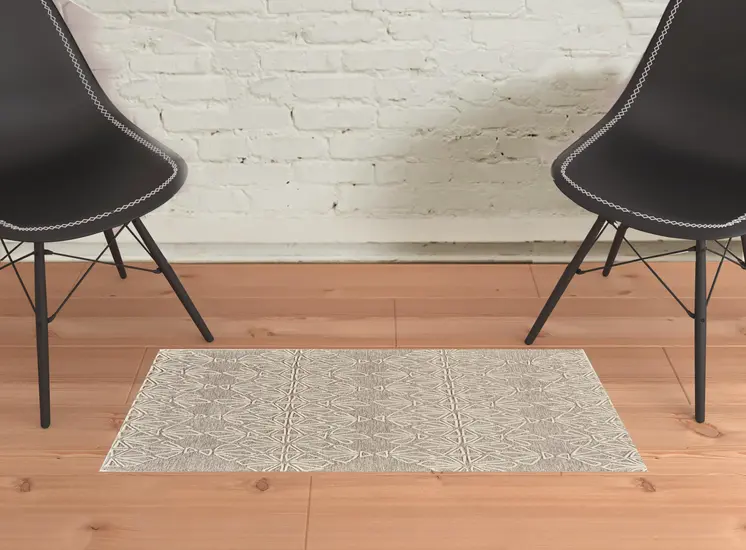 2' X 3' Tan And Ivory Wool Geometric Tufted Handmade Stain Resistant Area Rug