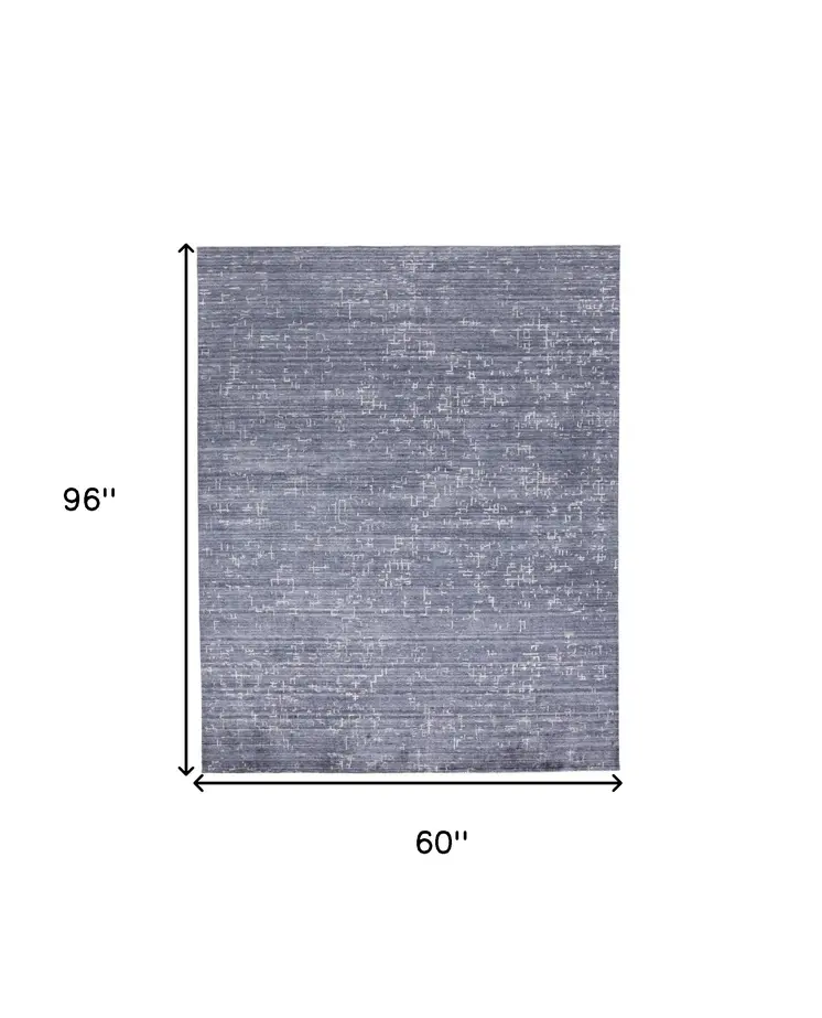 5' X 8' Blue And Ivory Abstract Hand Woven Area Rug