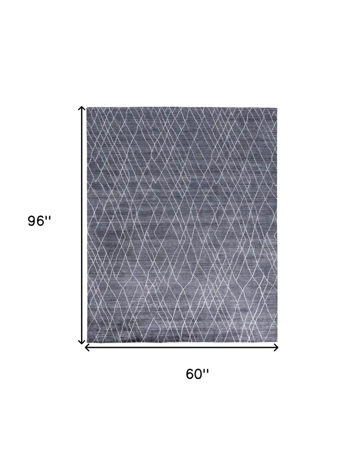5' X 8' Blue And Ivory Abstract Hand Woven Area Rug