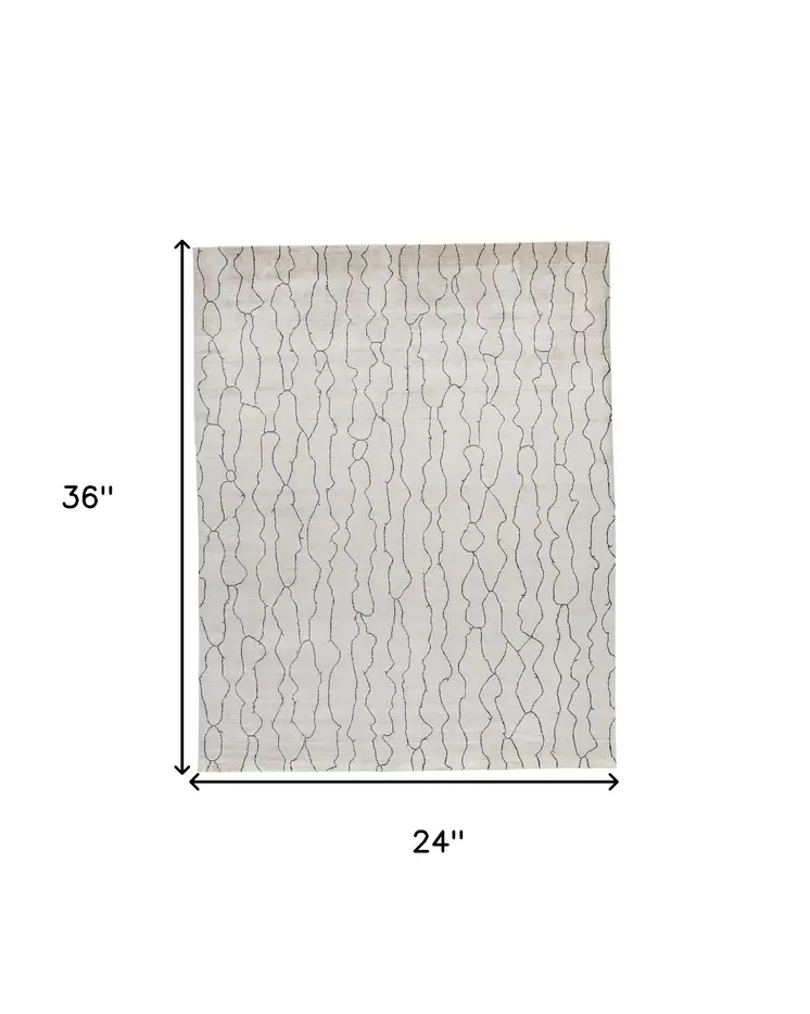 2' X 3' Gray and Ivory Abstract Hand Woven Area Rug