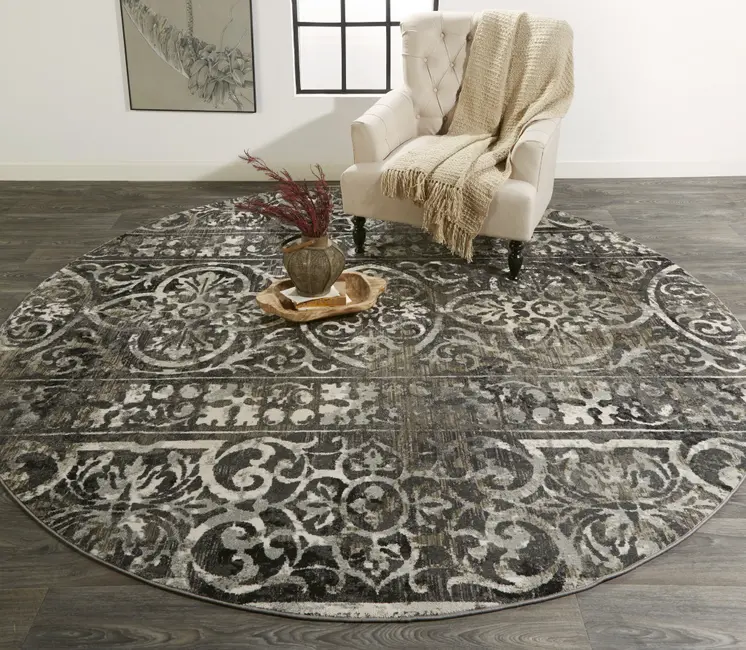9' Black and Ivory Round Abstract Area Rug