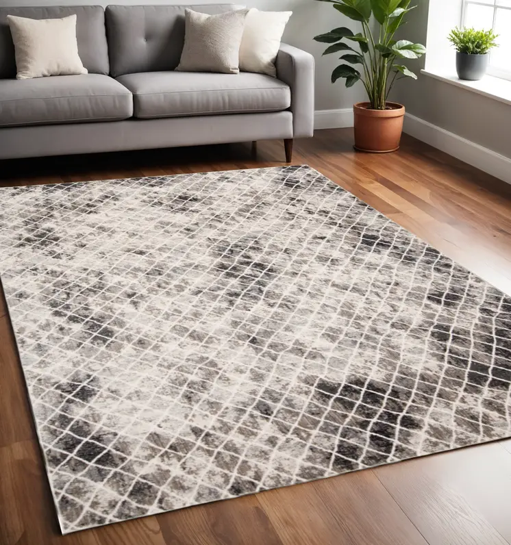 5' X 8' Ivory Gray And Taupe Abstract Stain Resistant Area Rug