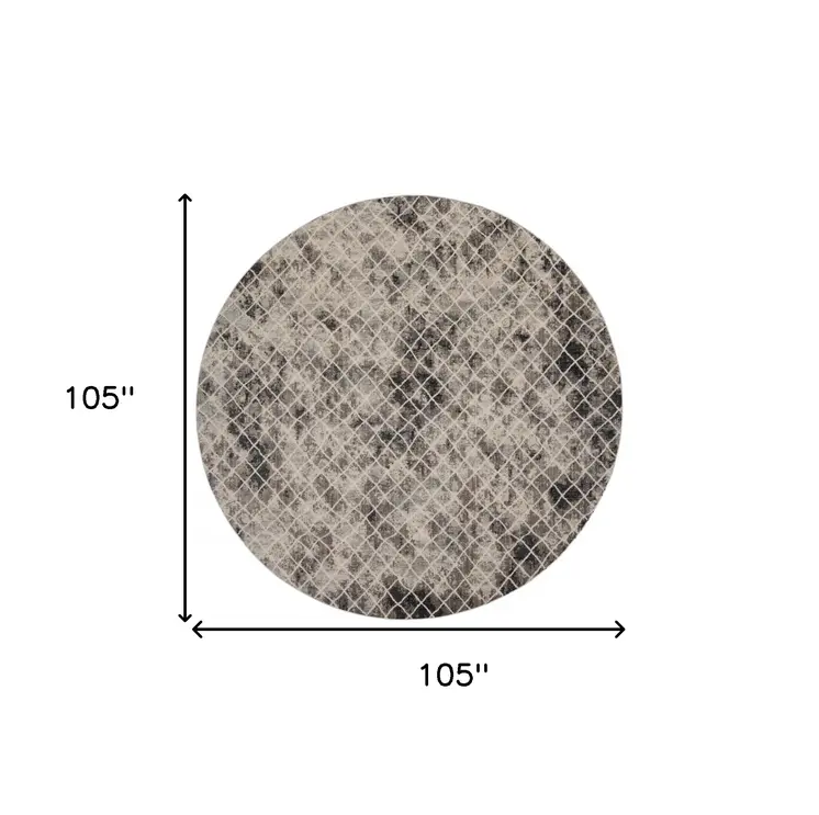 9' Ivory and Black Abstract Round Rug