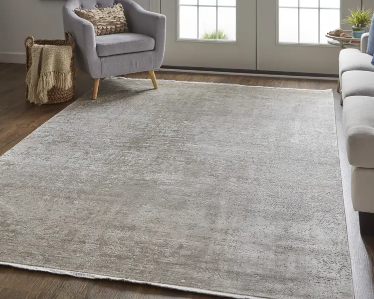 2' X 3' Tan and Ivory Abstract Power Loom Distressed Area Rug With Fringe