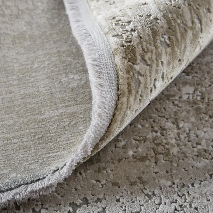 2' X 3' Tan and Ivory Abstract Power Loom Distressed Area Rug With Fringe