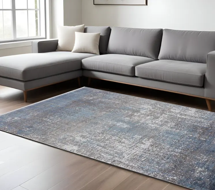 7' X 10' Blue and Gray Abstract Power Loom Distressed Area Rug With Fringe