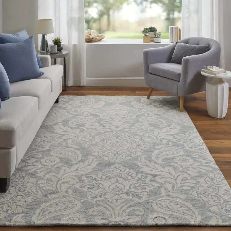 5' X 8' Blue And Ivory Wool Paisley Tufted Handmade Stain Resistant Area Rug
