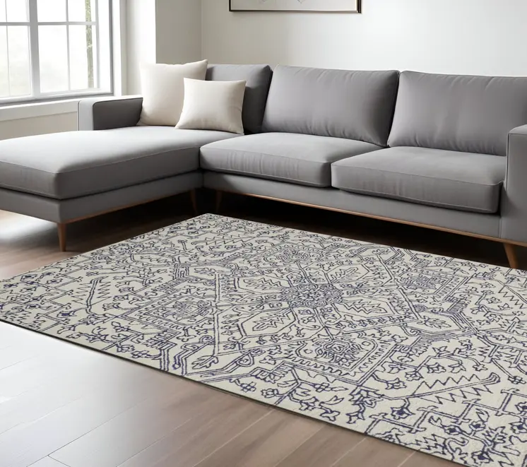 8' X 10' Ivory and Blue Wool Floral Hand Tufted Area Rug