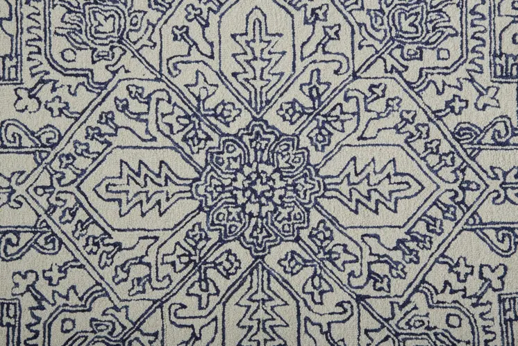 8' X 10' Ivory and Blue Wool Floral Hand Tufted Area Rug