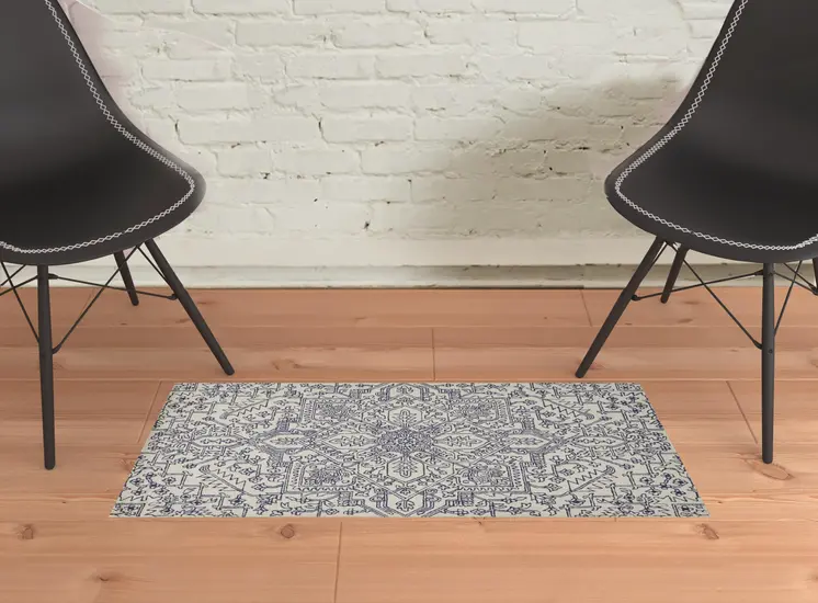 2' X 3' Ivory And Navy Wool Floral Tufted Handmade Stain Resistant Area Rug