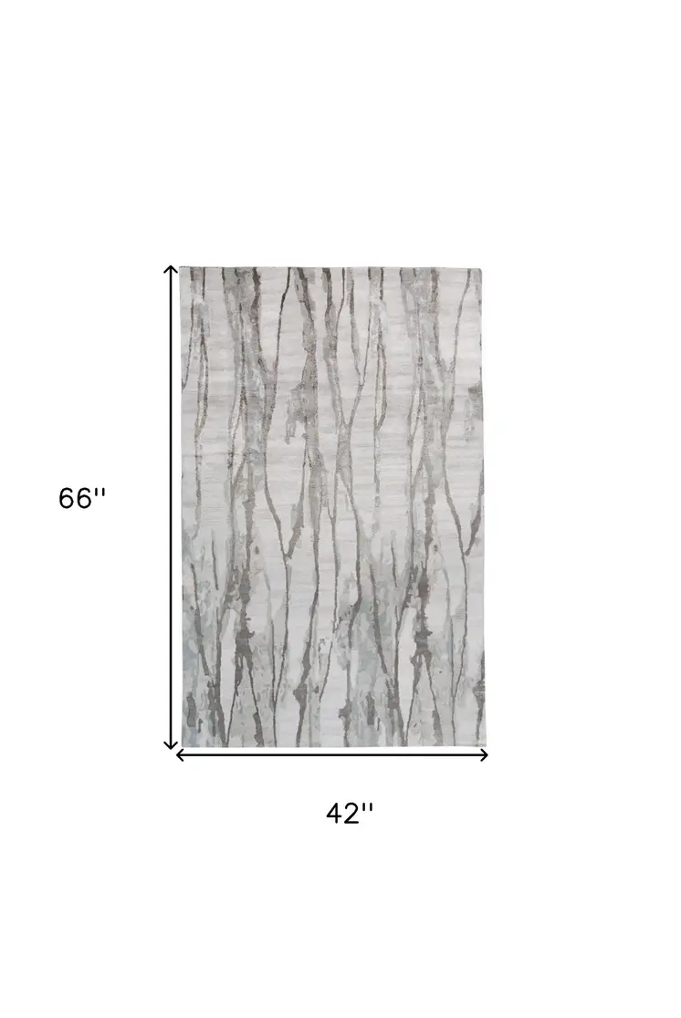 4' X 6' Ivory and Gray Abstract Hand Tufted Area Rug