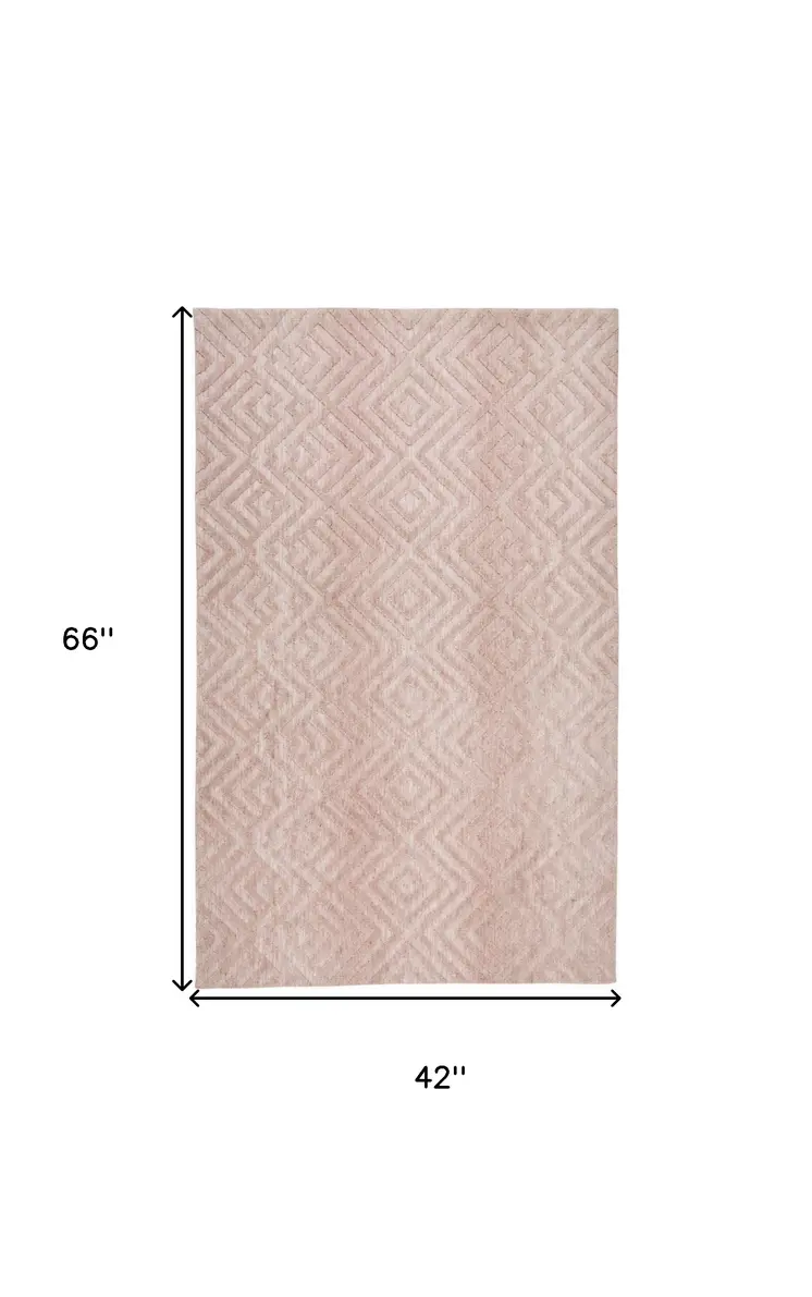 4' X 6' Pink And Ivory Geometric Stain Resistant Area Rug