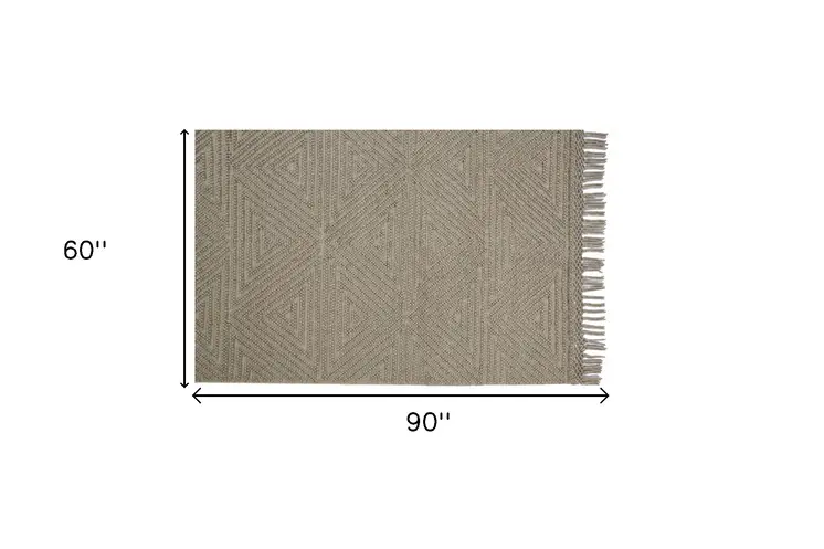 5' X 8' Tan And Ivory Wool Geometric Hand Woven Area Rug With Fringe