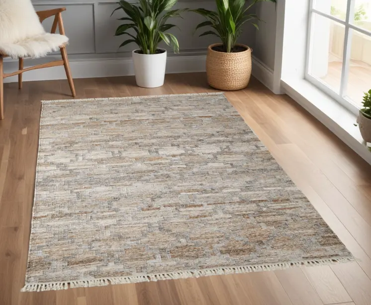 4' X 6' Tan and Gray Geometric Hand Woven Area Rug With Fringe
