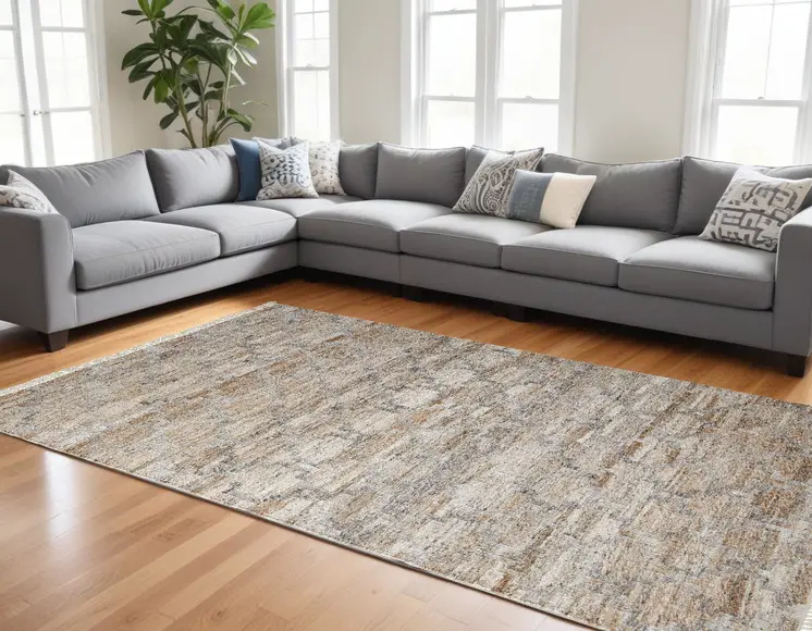 10' X 13' Tan Gray And Ivory Geometric Hand Woven Stain Resistant Area Rug With Fringe
