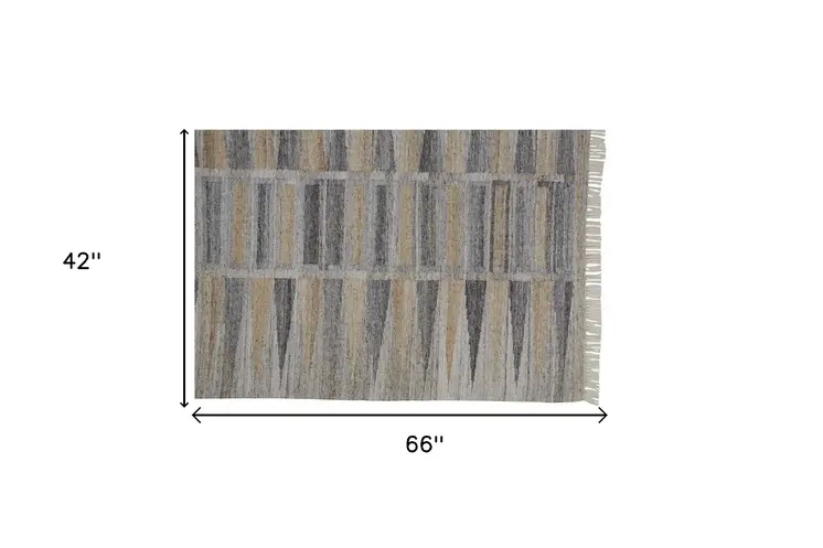 4' X 6' Tan and Gray Geometric Hand Woven Area Rug With Fringe