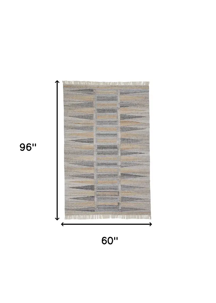 5' X 8' Tan Gray And Taupe Geometric Hand Woven Stain Resistant Area Rug With Fringe