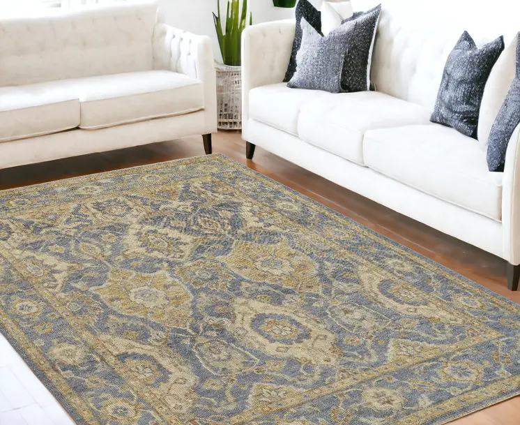 5' X 8' Blue Gold And Tan Wool Floral Hand Knotted Stain Resistant Area Rug With Fringe