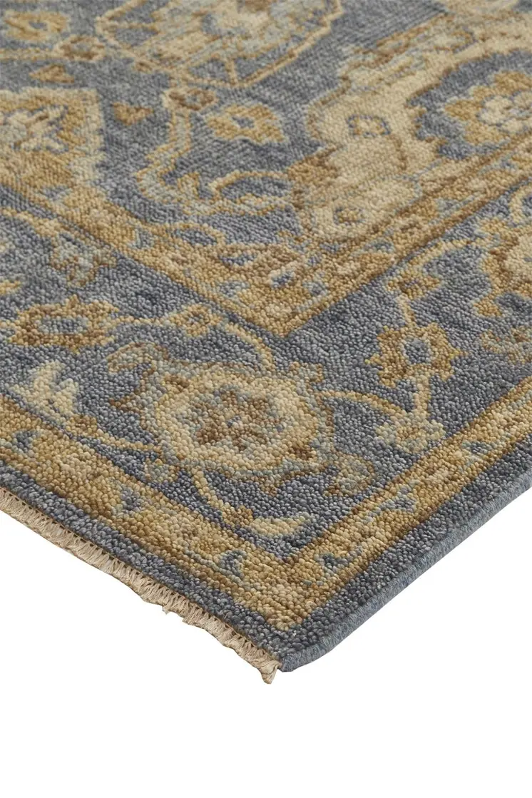 8' X 10' Blue Gold And Tan Wool Floral Hand Knotted Stain Resistant Area Rug With Fringe
