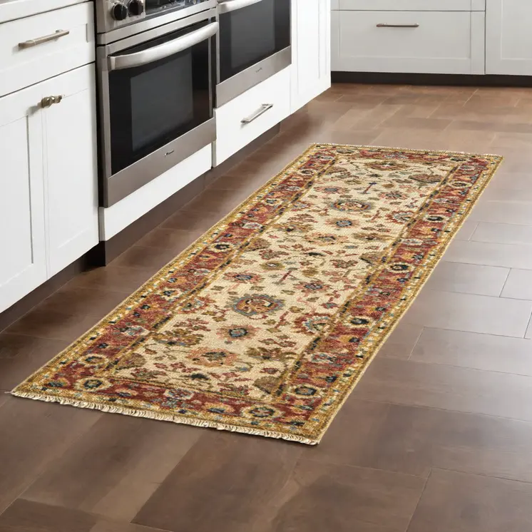 8' Ivory Red And Blue Wool Floral Hand Knotted Stain Resistant Runner Rug