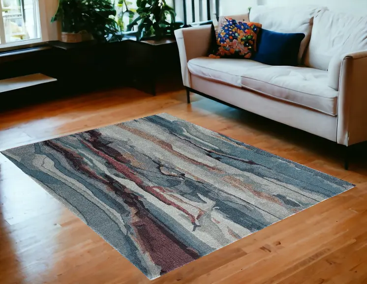 5' X 8' Blue and Orange Wool Abstract Hand Tufted Area Rug