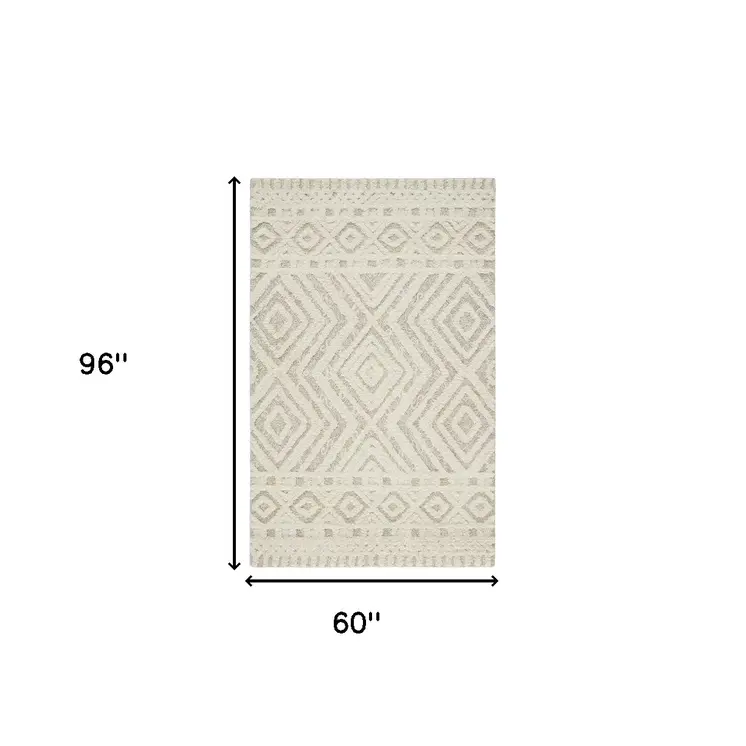 5' X 8' Ivory And Tan Wool Geometric Tufted Handmade Stain Resistant Area Rug