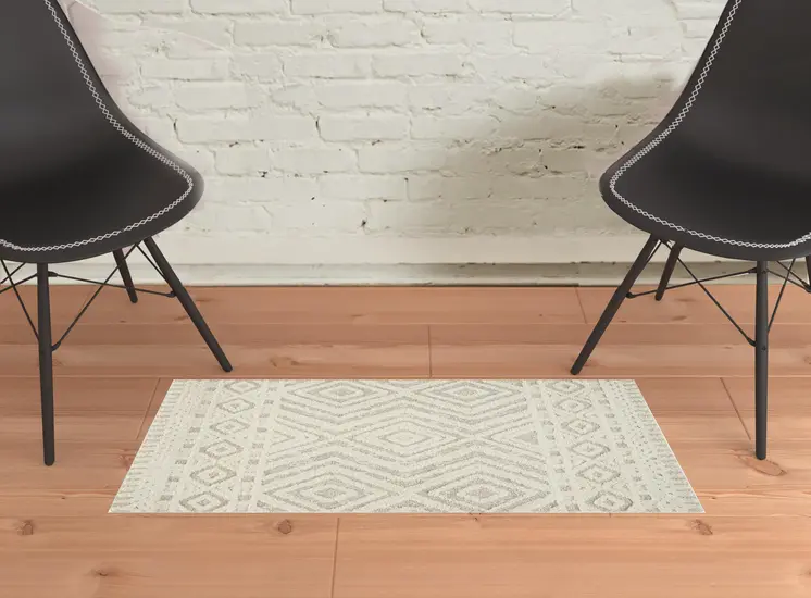 2' X 3' Ivory And Tan Wool Geometric Tufted Handmade Stain Resistant Area Rug