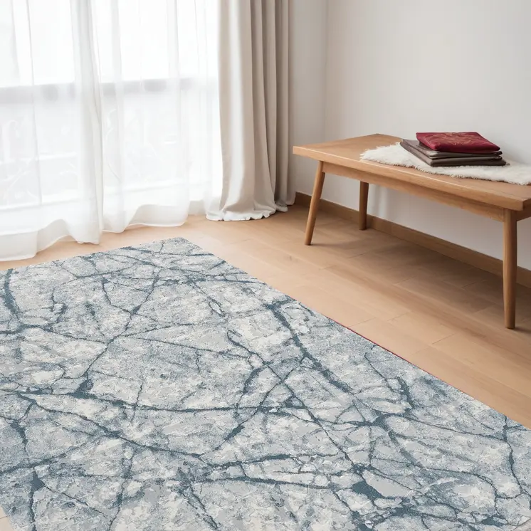 5' X 8' Blue Gray And Ivory Abstract Distressed Stain Resistant Area Rug
