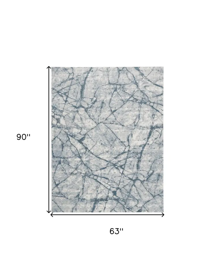 5' X 8' Blue Gray And Ivory Abstract Distressed Stain Resistant Area Rug